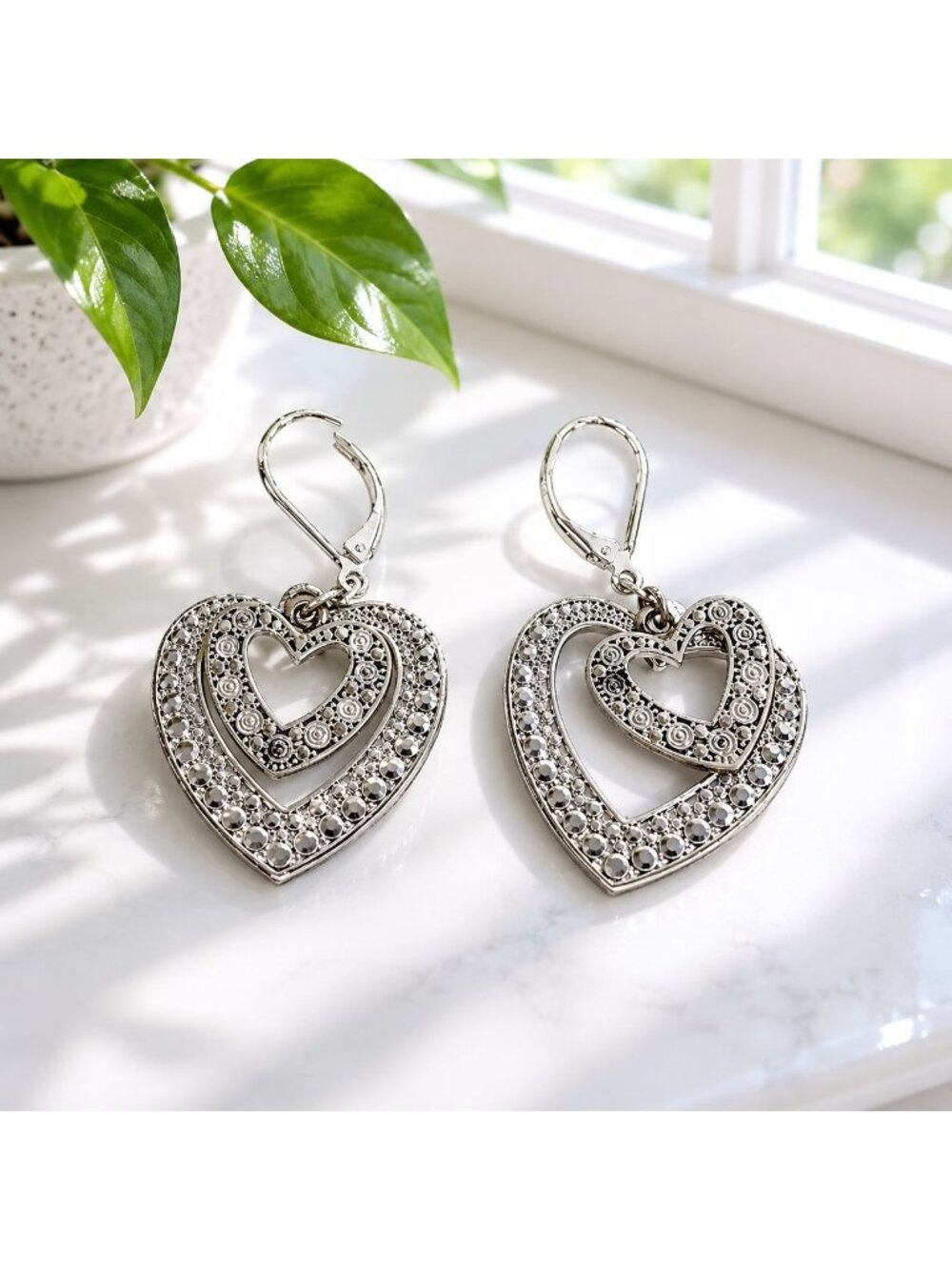 Heart-Shaped Silver-Tone Leverback Earrings With Intricate Filigree Pattern